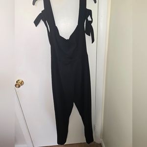 Guess Black off the shoulder jumpsuit size XL